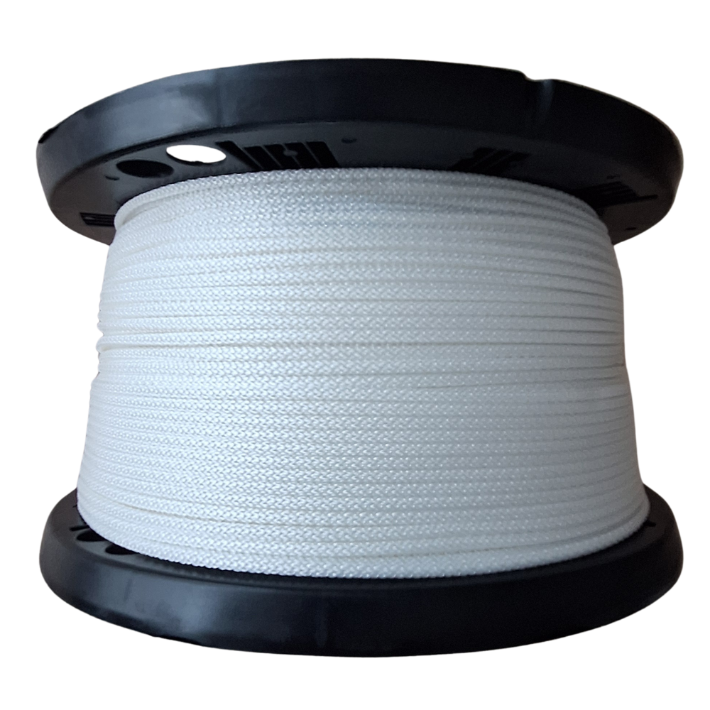 Spool of white rope on a black reel with a white background