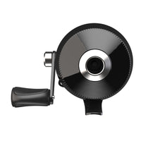 Black and silver fishing reel on a white background